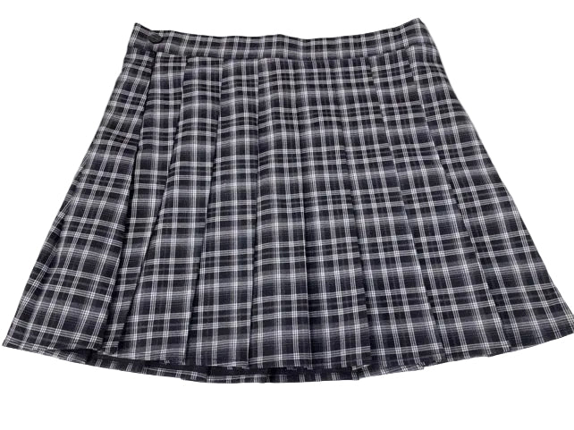 A pleated plaid skirt in a dark gray, black, and white pattern for tall girls with longer inseams!
