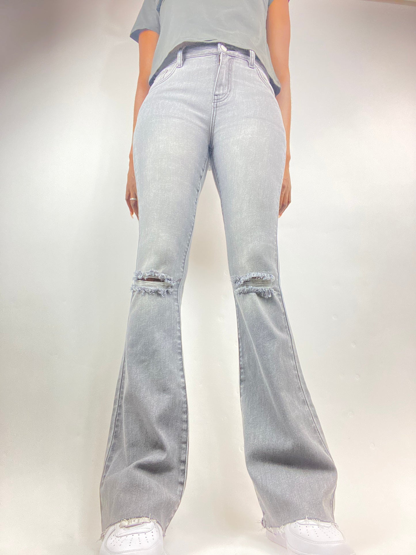 tall girl flared jeans in gray wash with  distressed knee